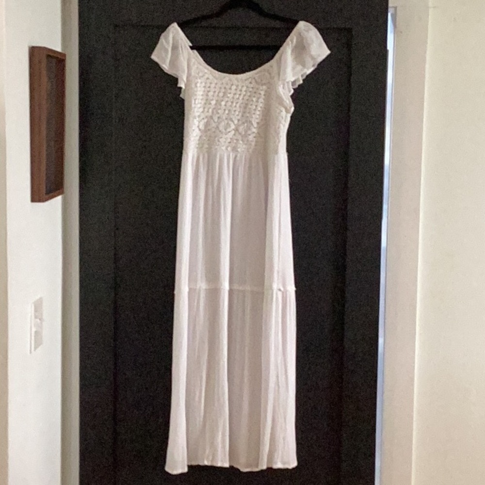 Sincerely Jules white maxi dress. It’s beautiful